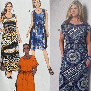 May include: Butterick B6210 sewing pattern featuring illustrations of four different dress designs. The pattern includes a variety of styles, including a maxi dress with a geometric print and a short-sleeved orange dress. The pattern is for sizes 18W-24W.