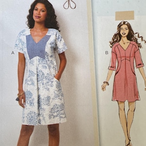 May include: A sewing pattern package featuring a dress design. The package includes a photo of a woman wearing a blue and white patterned dress and a line drawing of a pink dress. The brand name "Lisette" and the pattern number "B6567" are visible.