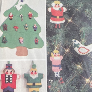 May include: A vintage Butterick sewing pattern for Christmas ornaments. The pattern includes felt ornaments in the shapes of Santa Claus, elves, a nutcracker, and a Christmas tree. The pattern is one size.