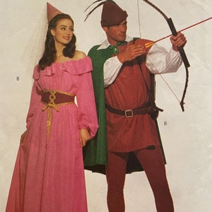 May include: A sewing pattern for a princess and a hunter costume. The pattern is for sizes XS, S, and M. The pattern number is 5749.
