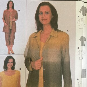 May include: A sewing pattern package labeled "Burda 8624" featuring images of a woman wearing a shirt and pants set, a shirt, and a tank top. The package includes text in English, French, and Spanish, with size information.