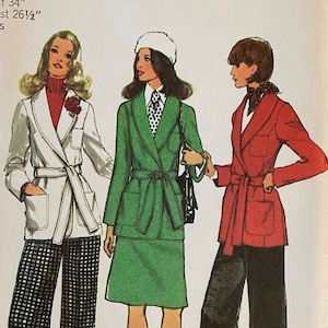 May include: A vintage sewing pattern for a women's jacket. The pattern is for size 12, with a bust measurement of 34 inches and a waist measurement of 26 1/2 inches. The pattern shows three different styles of jackets, all with a belted waist. The jackets are shown in white, green, and red.