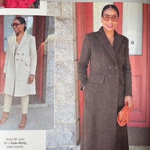 May include: A sewing pattern package featuring a woman in a long brown coat. The package includes the text "BEAUTE' J'ADORE knowME by mimiG" and size information. It also has a QR code for a sew-along video tutorial and the text "Designed and printed in USA."