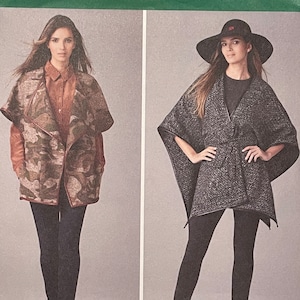 May include: Simplicity sewing pattern number 1281 for a wrap top with four different variations. The pattern includes a blue, brown, grey, and burgundy top. The pattern is designed and printed in the USA.