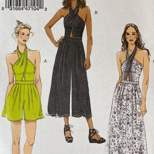 May include: A Very Easy Vogue sewing pattern, V9259, featuring illustrations of three different halter-style jumpsuits and a romper. The pattern includes sizes 14-16-18-20-22. The cover art shows the garments in various colors and patterns.