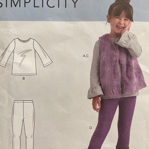 May include: Simplicity sewing pattern S9198 for children's clothing. The pattern includes diagrams for a long-sleeved top, leggings, and a faux fur vest. The pattern size is for European sizes 3-8.