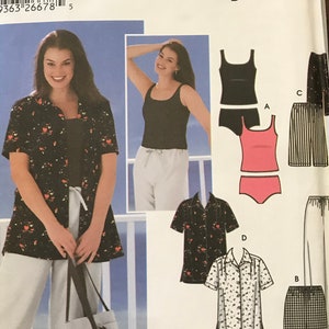 May include: Simplicity sewing pattern number 5571, easy-to-sew, for sizes 26W-32W. The pattern includes five different designs: a black and white floral print shirt, a black tank top, a pair of white pants, a pink and white striped tank top, and a pair of black and white checkered pants. The pattern also includes instructions for making a tote bag.