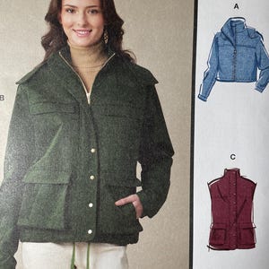 May include: McCall's sewing pattern package featuring a woman modeling a green jacket. The package includes illustrations of a blue jacket and a burgundy vest. The text reads "Designed and printed in USA."