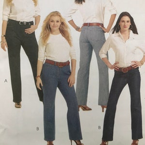 May include: McCall's sewing pattern M5894 for "The Perfect Jean." The package features images of women wearing jeans and white shirts. The text includes "Classic Fit," and sizing information.