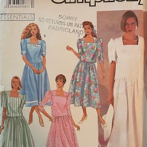 May include: Simplicity sewing pattern number 7063 for sizes 14-22. The pattern includes five different styles of dresses, all with a square neckline and puff sleeves. The dresses are shown in various colors and patterns, including blue, green, pink, and floral.