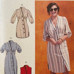May include: McCall's sewing pattern M7890. The pattern features illustrations of button-down dresses in various styles. The cover includes a photo of a woman wearing a striped dress. Size E5 (14-16-18-20-22).