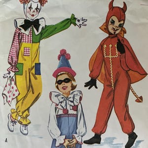 May include: Vintage McCall's sewing pattern for children's costumes. The pattern features illustrations of a clown, devil, and little prince outfits. The pattern number is 2459, size small, for children ages 2-4.