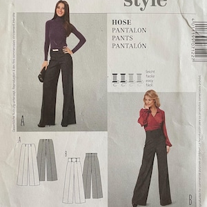May include: Burda Style sewing pattern number 7122 for pants. The pattern includes sizes 34 to 46 and 8 to 20. The pattern includes seam and hem allowances. The pattern is for pants with a wide leg.