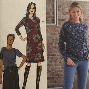 May include: A Butterick sewing pattern, B6859, with illustrations of women's clothing designs. The pattern includes a long-sleeved dress with floral accents, a short-sleeved top with a skirt, and a long-sleeved top with matching trousers. The size range is LRG-XLG-XXL.