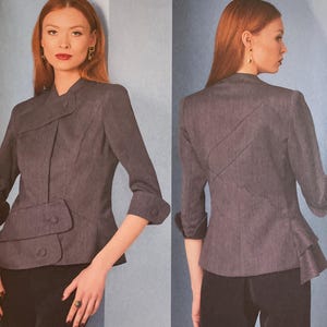 May include: Vogue Patterns sewing pattern V1839. The pattern features a tailored jacket with a unique asymmetrical design, including a wrap-style front and peplum detail. The pattern includes sizes B5 (8-10-12-14-16). The Claire Shaeffer's Custom Couture Collection.