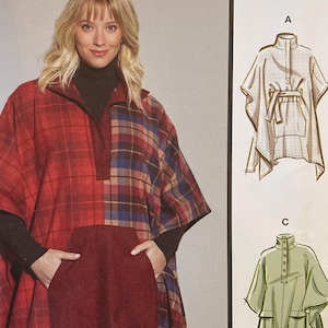 May include: McCall's sewing pattern M8347 featuring a woman wearing a red and blue plaid poncho with a large front pocket. The pattern includes multiple view options and is designed and printed in the USA.