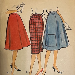 May include: A vintage McCall's sewing pattern for misses' and juniors' slim and full skirts. The pattern number is 5121. The pattern is for sizes 30 waist and 40 hip. The pattern is printed on a light brown paper with a white border. The pattern features three different skirt styles: a red skirt, a plaid skirt, and a blue skirt.