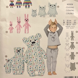 May include: A Burda Style sewing pattern package with designs for stuffed animals, such as bears, cats, and rabbits. The package includes size measurements in cm and the text "Super Easy".