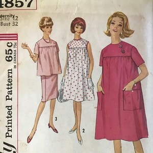 May include: Vintage Simplicity maternity sewing pattern. The pattern features three dress designs, including a pink dress with pockets and a white dress with red polka dots. The pattern is size 12, bust 81 cm.