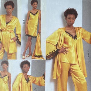 May include: Vogue Patterns sewing pattern V1962. The pattern features a yellow satin pajama set with black lace trim. The set includes a camisole, pants, a robe, and a short dress. The pattern is for sizes A5 (6-8-10-12-14).