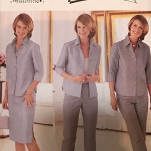 May include: A sewing pattern for a women's blouse and trousers. The pattern is by Butterick and designed by Cynthia Rowley. The pattern number is 6163 and the size is 12-14-16.