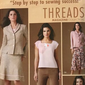 May include: Simplicity sewing pattern 4368. The pattern features a woman wearing a skirt suit, pants, and a jacket. The pattern includes the text "Step by step to sewing success!" and "THREADS MAGAZINE COLLECTION".