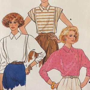 May include: A vintage sewing pattern for women's tops, sizes 6-8-10. The pattern includes three different styles: a striped top with short sleeves, a white blouse with long sleeves, and a pink blouse with long sleeves. The pattern is from Butterick and is labelled "Fast & Easy".