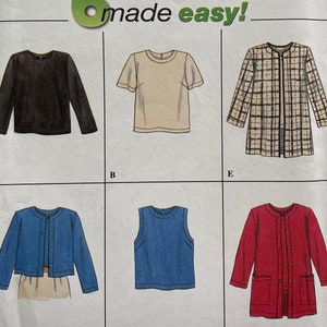 May include: Simplicity sewing pattern number 7381 for sizes 6, 8, and 10. The pattern includes five different garment designs: a black long-sleeved top, a beige short-sleeved top, a plaid jacket, a blue sleeveless top, and a red jacket.