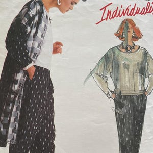 May include: Vogue Patterns Individualist sewing pattern featuring two outfits by Carol Horn. The first outfit is a black and white checkered jacket with black and white patterned pants. The second outfit is a loose-fitting, light-colored top with black and white patterned pants.