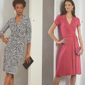 May include: Vogue Patterns sewing pattern featuring two dress designs. One dress is a black and white geometric print with a wrap style. The other is a solid pink wrap dress. The pattern is size A5 (6-8-10-12-14).