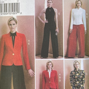 May include: Vogue Wardrobe sewing pattern featuring various women's outfits. The pattern includes a red blazer and black pants, a black jumpsuit, a white blouse with red pants, a red suit, and a floral dress. The pattern number is V9351.