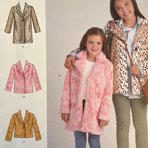 May include: Simplicity sewing pattern S9027 for children's coats. The pattern includes designs for a leopard print coat, a pink faux fur coat, and a tan coat. The pattern size is U.S. 3-6.