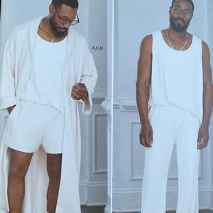 May include: Simplicity sewing pattern featuring a white pajama set with shorts, a tank top, and a robe. The pattern includes sizes S-XXL. The design is by Norris Dánta Ford.