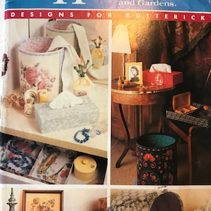May include: A Better Homes and Gardens sewing pattern for home decor projects. The pattern includes instructions for making a variety of items, including a tissue box cover, a wastebasket, and a decorative tray. The pattern is for one size and is numbered 4350.