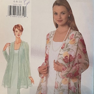 May include: A sewing pattern for a dress and jacket. The pattern is for sizes 6-8-10. The dress is a simple, sleeveless design. The jacket is a floral print with a long, flowing style. The pattern is from Butterick.