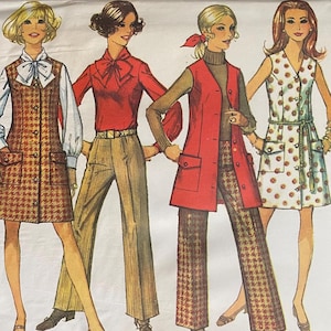 May include: A vintage Simplicity sewing pattern with illustrations of five women in 1970s outfits. The outfits include dresses, pantsuits, and a vest and trousers combination. The pattern is size 14, bust 91 cm, and includes the text "Mini-Length."