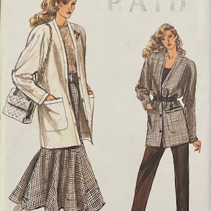 May include: A sewing pattern for a jacket and skirt. The pattern is for sizes 20-22-24. The pattern is called "Very Easy Very Vogue" and the number is 9980. The pattern is for a plaid jacket and skirt.