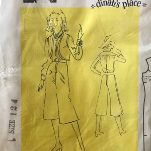 May include: A vintage sewing pattern for a pair of culottes, featuring a yellow background with black line drawings of a woman wearing the culottes. The pattern is for Dinah Shore's Pattern Collection for Singer Sewing Center, as seen on *dinah's place*. The pattern is size 12.