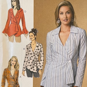 May include: A Butterick sewing pattern, B6629, featuring illustrations of wrap-style blouses. The pattern includes various designs, such as a red ruffled top, a polka-dot wrap top, and a striped wrap blouse. The pattern size range is A5 (6-8-10-12-14).