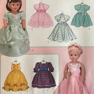 May include: A sewing pattern for making doll dresses. The pattern includes instructions for making five different dresses, including a pink dress with a matching jacket, a green dress with a matching jacket, a floral print dress, a plaid dress, and a pink tulle dress. The pattern is from Simplicity and is designed by Elaine Heigl.