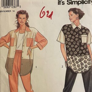 May include: A sewing pattern for two garments. The pattern is for a long-sleeved shirt with a pocket and a pair of pants. The shirt has a black and white polka dot pattern. The pants are a solid color. The pattern is labeled "7769" and "It's SO EASY it's Simplicity."
