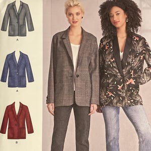 May include: Simplicity sewing pattern 8697 BB featuring blazer designs. The pattern includes multiple blazer styles, with options for different fabrics and details. The cover shows two women wearing blazers, showcasing the finished garments. Size U.S. 20W-28W.