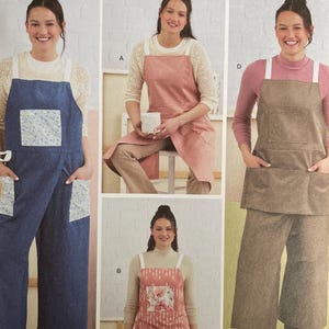May include: Simplicity sewing pattern S3021 showing apron designs. The pattern includes various apron styles, with models wearing different colours and fabrics. The text "easy-to-sew" is visible.