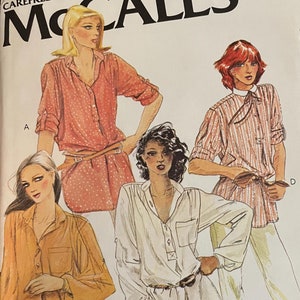 May include: A sewing pattern for a shirt with four different styles. The pattern is from McCall's and is for a miss size small. The pattern is $1.75.