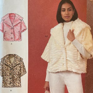 May include: Simplicity sewing pattern S3009 featuring a woman wearing a faux fur jacket and carrying a matching handbag. The pattern includes designs for a pink jacket and a leopard print jacket. Size U.S. 16-24.