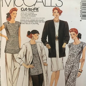 May include: A sewing pattern for a dress with a striped bodice and a solid skirt. The pattern is called "Cut-to-Fit" and is for sizes 14, 16, and 18. The pattern is called "Easy Non-Stop Wardrobe" and is for a petite figure.
