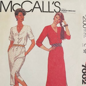 May include: McCall's pattern 7002 for a dress with a V-neck, short sleeves, and a slit up the front. The pattern is for women's sizes 38 to 42 bust. The pattern is $2.00.
