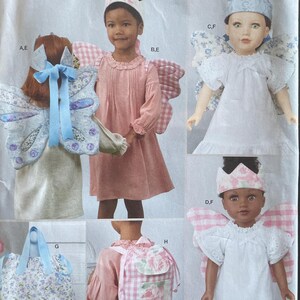 May include: A sewing pattern for children's fairy costumes, featuring a pink dress, wings, and a crown. The pattern includes a backpack and a tote bag with floral patterns. The text "LAURA ASHLEY SINCE 1953" is visible.
