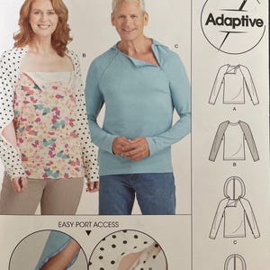 May include: Simplicity sewing pattern S9723 featuring adaptive clothing designs. The pattern includes options for long-sleeved tops with easy port access, shown in light blue and floral prints. The package includes size options from XS to XL.