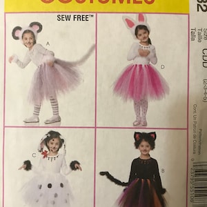 May include: Sew Free™ McCall's Costumes pattern for children's costumes. The pattern includes four costumes: a mouse, a bunny, a dalmatian, and a cat. The pattern is for sizes 2-3-4-5. The pattern is printed on a white background with black text.